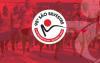 Imagem da corrida de São Silvestre, em tons de vermelho, acompanhada do logo da edição de 2023