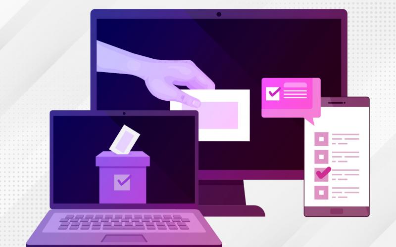 Desenho mostra três aparelhos eletrônicos. À esquerda, um laptop, à direita um telefone celular e , ao fundo, um computador de mesa. Nas telas dos aparelhos desenhos de urnas e mçaos depoistando votos nas urnas