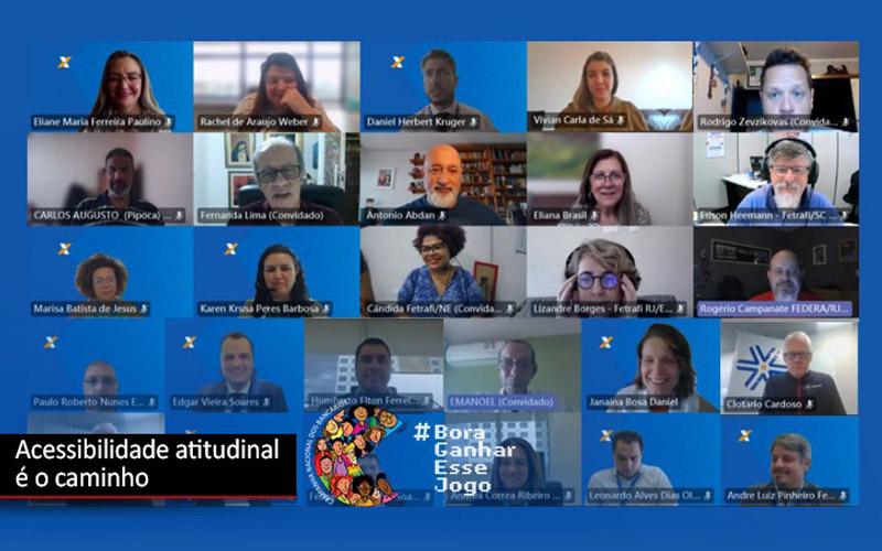 Imagem composta por tela de computador que mostra os rostos de todos os representantes da Caixa Econômica Federal que participaram da negociação que debateu as condiçõees de trabalho das pessoas com deficiência