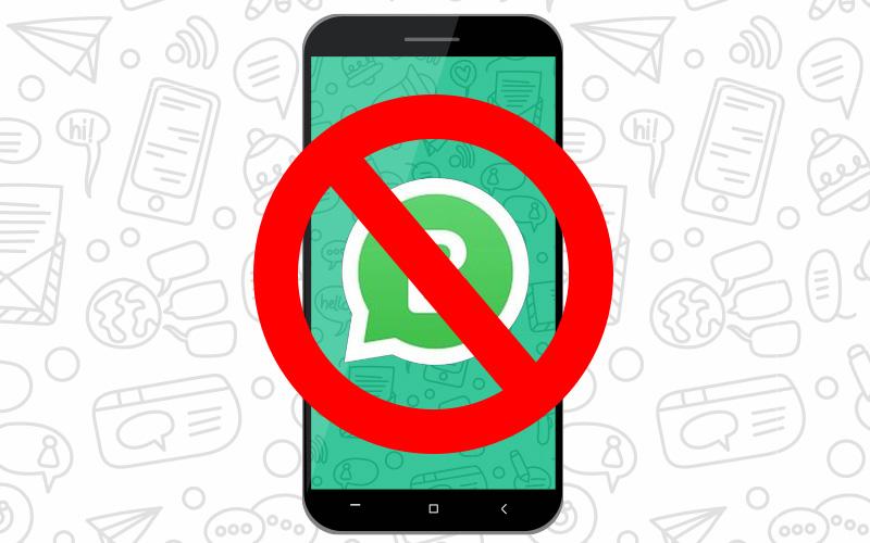 Desenho de celular com logo do whatsapp sob o símbolo de proibido