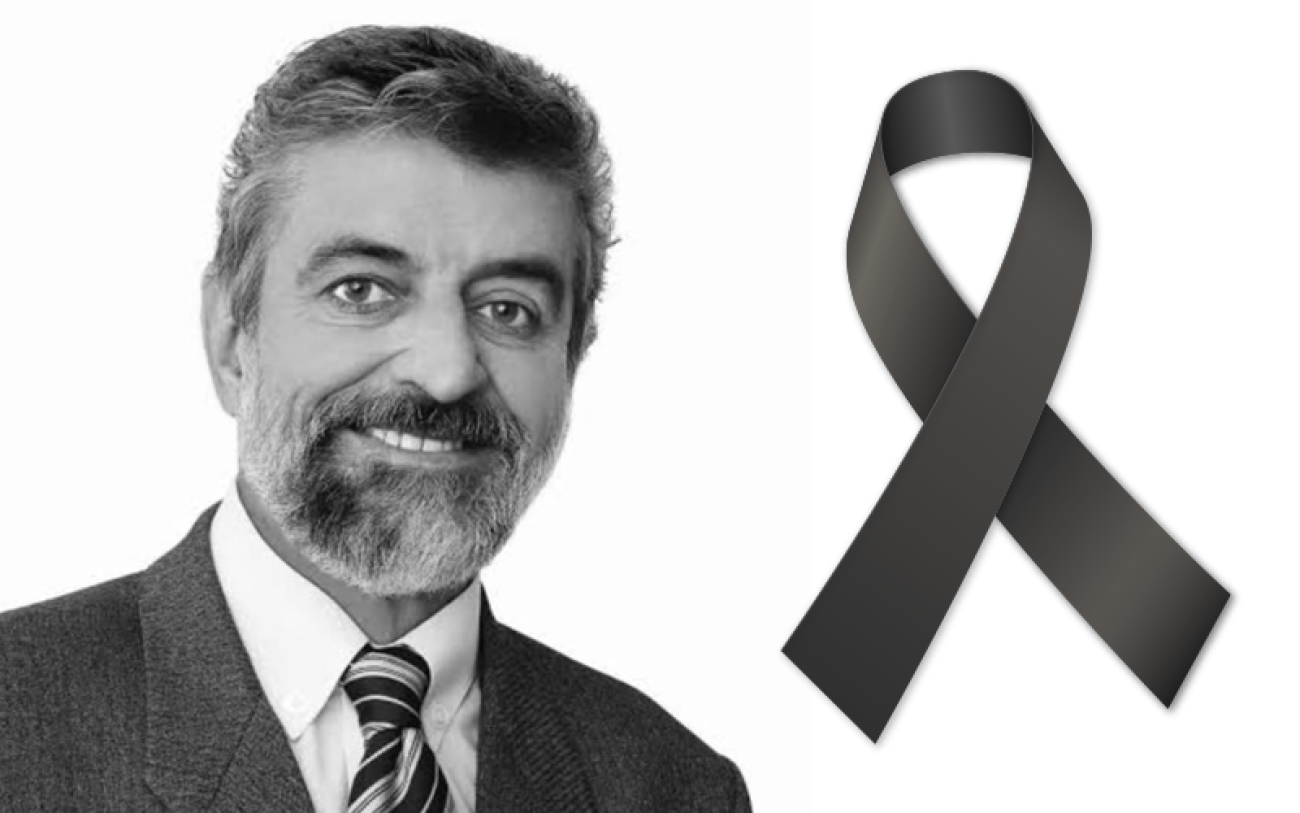 Reprodução Imagem de Marcos Martins, acompanhada de um laço de luto