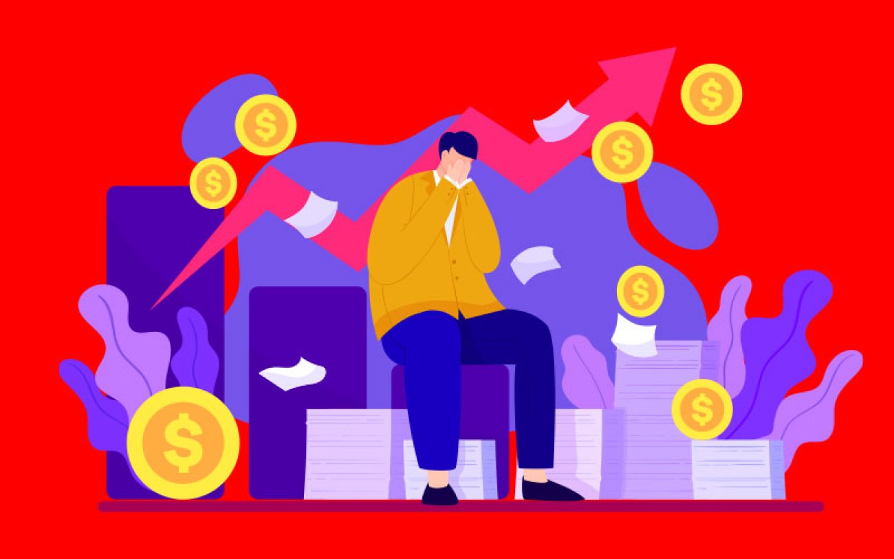Imagem: Freepik Ilustração com gráficos ascendentes, pilhas de papeis, moedas e uma pessoa angustiada ao centro