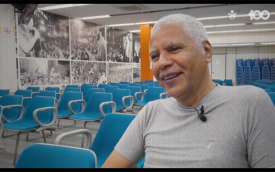 Nelson Ezidio, cabelo grisalho e camisa cinza