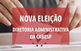 "Nova eleição diretoria administrativa da Cabesp", sobre um retângulo vermelho e, ao fundo, uma foto com as mãos de uma pessoa da etnia branca