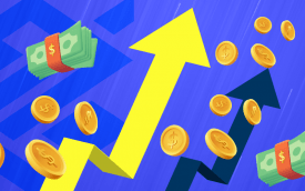 Imagem de um gráfico ascendente, com moedas e notas ao redor 