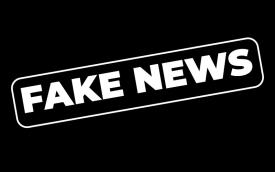 Expressão "Fake News" em fundo preto