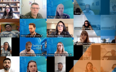 Print da tela de reunião virtual. A imagem mostra os rostos dos participantes da reunião, lado a lado