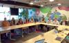 Imagem mostra Comissão de Organização dos Empregados (COE) do Santander reunida em uma sala