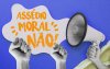 Imagem de um megafone e de um punho cerrado, acompanhados da frase "assédio moral não!"