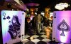 Fotografia mostra o ambiente montado para torneio de poker dos bancários