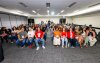 Imagem mostra dirigentes sindicais sentados em plenário lotado durante encontro nacional do Santander
