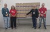 Dirigentes do Sindicato posam com doações de cestas básicas para a campanha Bancário Solidário