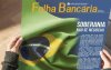 Imagem de uma pessoa segurando a Folha Bancária nas mãos