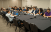 Foto da mesa de negociação, com representantes dos trabalhadores e representantes do Banco do Brasil
